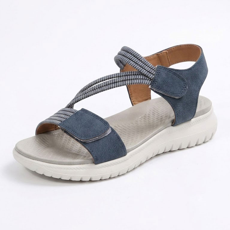 Sandale ortopedice confortabile — suport ergonomic pentru arcada piciorului, lățime reglabilă, care subliniază silueta picioarelor.