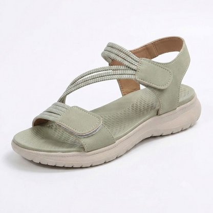 Sandale ortopedice confortabile — suport ergonomic pentru arcada piciorului, lățime reglabilă, care subliniază silueta picioarelor.