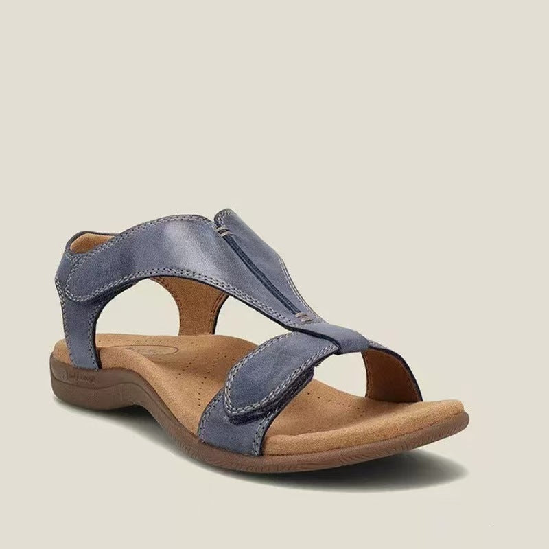 Sandale ortopedice confortabile — suport ergonomic pentru arcada piciorului, lățime reglabilă, care subliniază silueta picioarelor.